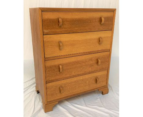 LIGHT OAK CHEST OF DRAWERSwith a moulded top above four drawers with D shaped handles, standing on bracket feet, 96cm high 
