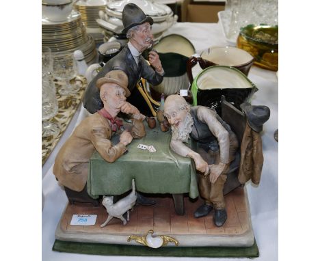 A Capodimonte group - 3 old men playing cards