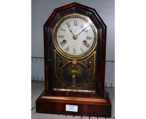 A 19th century American mahogany "octagon" top mantel clock with 30 hour movement