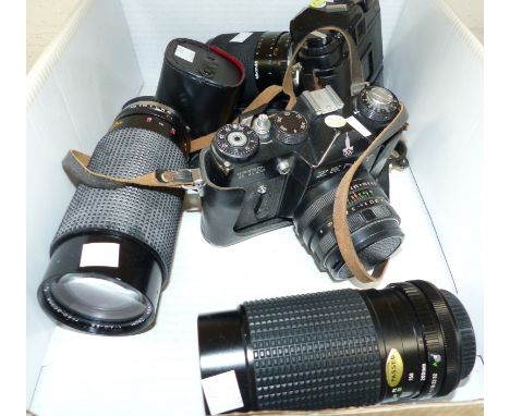 A Zenith TTL SLR camera; a Chinon C-E 45 with Miranda 70-210 zoom lens with motor drive; 2 lenses Sirioc 60-300 zoom lenses; 