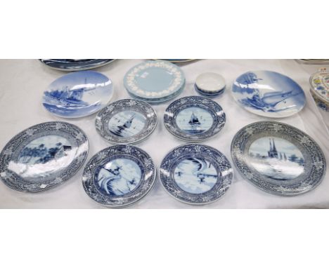 A pair of Delftware plaques; Blau Holland serving and dessert plates; 4 Wedgwood Queensware plates