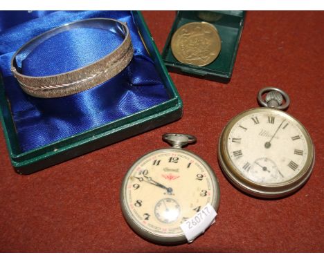 A Russian railway watch, Ingersoll; another watch; a silver bangle; etc.