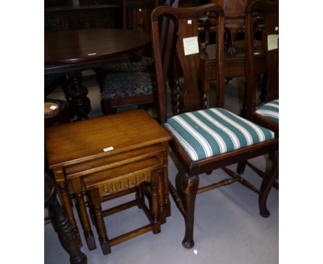 A nest of 3 oak occasional tables; a pair of oak Art Nouveau dining chairs