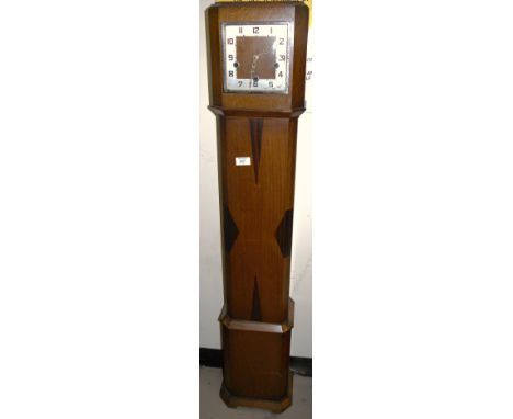 An Art Deco inlaid oak mantel clock with Westminster chime