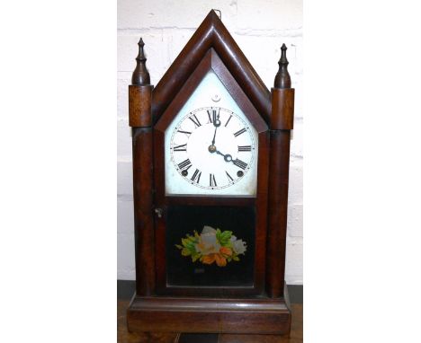 A 19th century American mahogany Gothic arch top mantel clock with 8 day striking movement