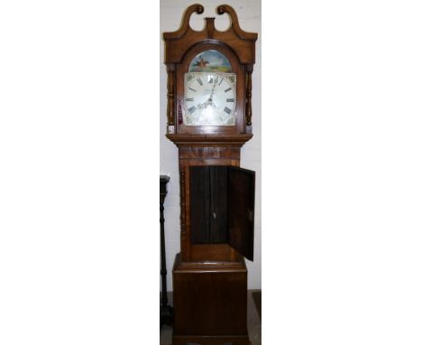 An early 19th century cottage longcase clock with swan neck pediment and turned columns to the hood and to the trunk with thr