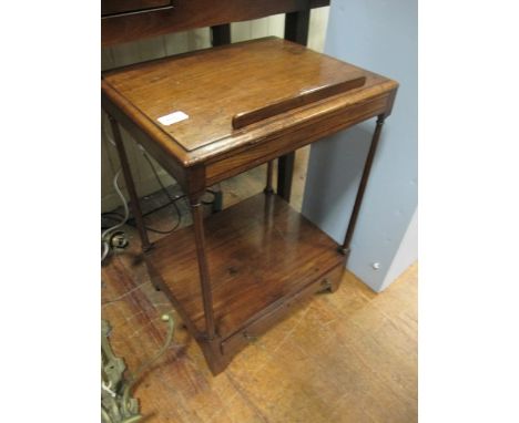 A GEORGIAN MAHOGANY OCCASIONAL TABLE the rectangular moulded top above an open shelf with frieze drawer joined by cylindrical