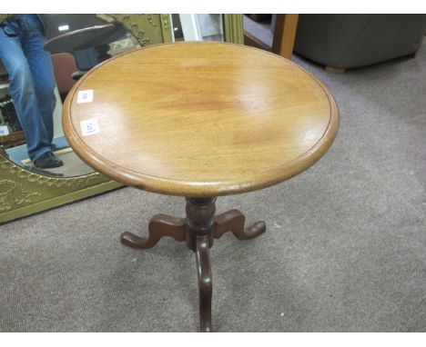 A VICTORIAN WINE TABLE the circular dish top above a baluster column on tripod support 56cm (h) x 46cm (d)