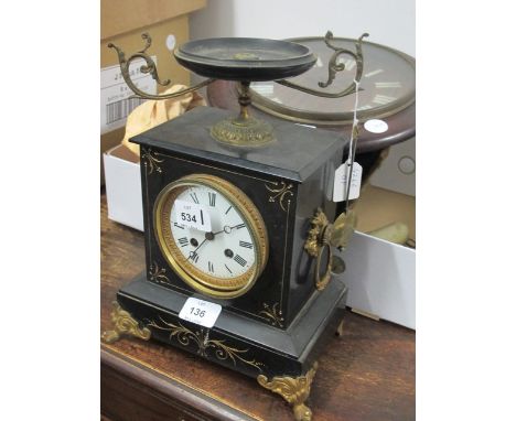 A BLACK SLATE MANTLE CLOCK 19th Century the rectangular case with circular dial and Roman numerals surmounted with a classica