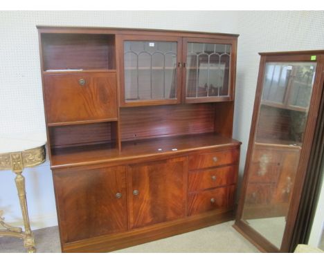 A MAHOGANY WALL CABINET the super structure with lead glass panel doors with hinged compartment above an open shelf the base 