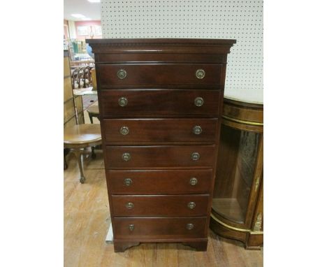 A MAHOGANY TALLBOY the rectangular top above seven long graduated drawers on bracket feet 132cm (h) x 68cm (w) x 67cm (d)