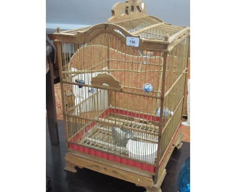 A PINE BIRD CAGE of rectangular form raised on bracket feet 87cm (h) x 41cm (s)