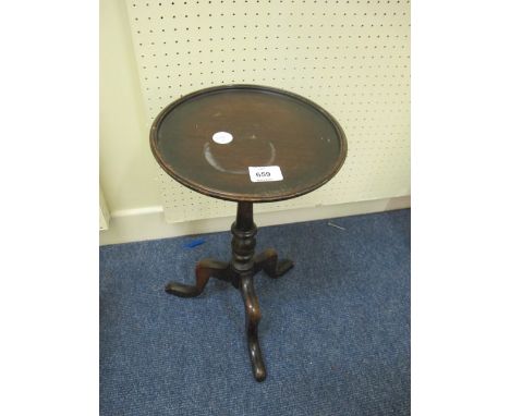 A MAHOGANY WINE TABLE the circular dish top above a baluster column on tripod support 47cm (h) x 26cm (d)