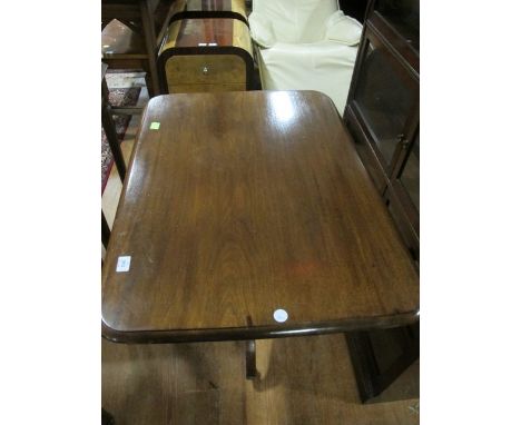 A GEORGIAN MAHOGANY SNAP TOP OCCASIONAL TABLE the rectangular top with rounded corners above a baluster column on tripod supp