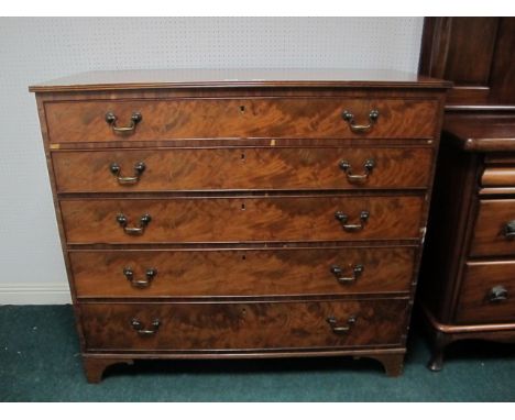 A GOOD GEORGIAN MAHOGANY CHEST the rectangular top above five long graduated drawers with brass drop handles on bracket feet 