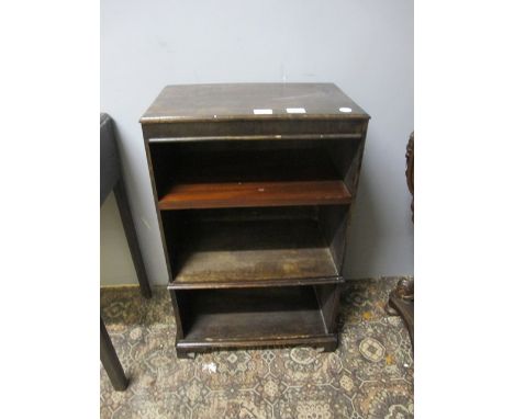 A PAIR OF MAHOGANY OPEN FRONT SIDE CABINETS the rectangular top above three open shelves on bracket feet 79cm (h) x 48cm (w) 