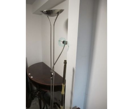 A CHROME FLOOR STANDARD LAMP together with a brass floor standard lamp (2)