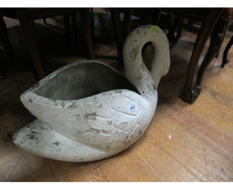 A COMPOSITION STONE PLANTER modelled as a swan 40cm high