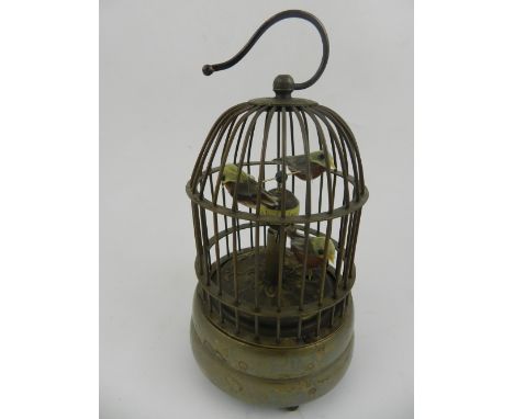 A Chinese automaton birdcage clock. H.18cm. 