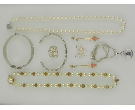 A quantity of costume jewellery, to include a bright cut sterling silver bangle, another white metal bangle, a pearl necklace