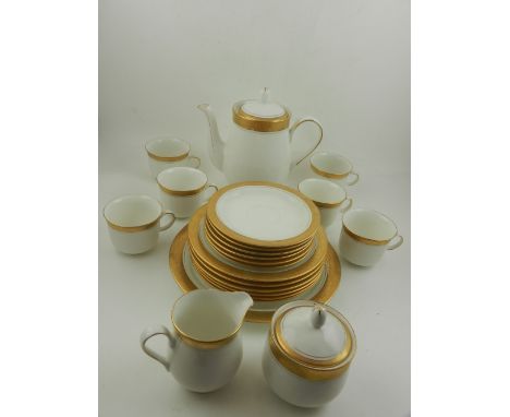 A Queens porcelain part tea service for six, decorated with gold rim on a white ground. 