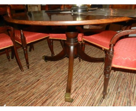 A George III Cuban mahogany circular breakfast table, raised on tripod base and casters. D.127cm