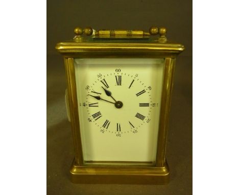 A brass five glass Carriage clock - Height 11 cm handle down
Condition report:  Working
