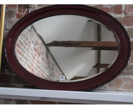 A carved aneroid barometer with thermometer - Height 87 cm 
Condition report:  Two pieces of moulding missing 