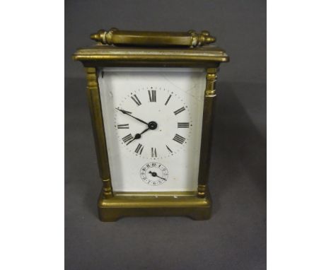 A brass timepiece Carriage alarm clock 
Condition report:  In need of restoration 