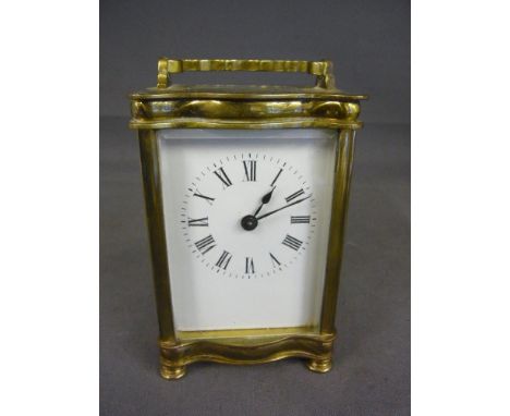 A brass carriage clock - Height 12 cm 
Condition report: Not working 