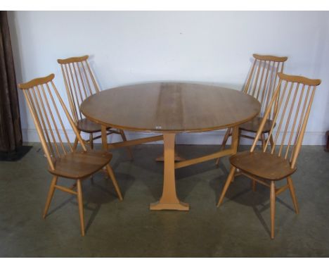 An Ercol dropleaf table and four chairs - 1.28 m x 1.39 m