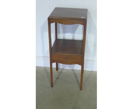 A 19th century mahogany light stand with a drawer