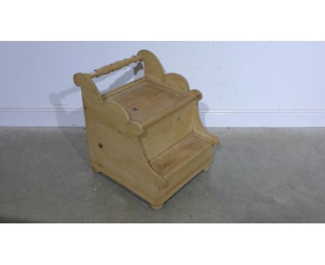 A 19th century Sleigh shaped stripped pine step commode - Width 51 cm x Length 65 cm 