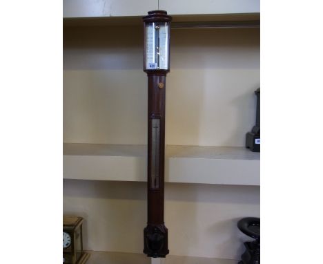 A good quality Georgian style walnut bowfronted stick barometer by Roselli of London - Height 97 cm 