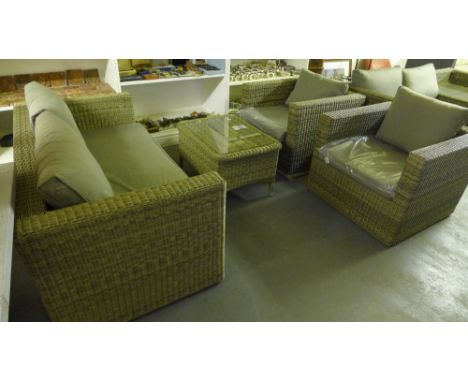 A Bramblecrest Sahara modular two seater sofa and two modular sofa chairs - all with cushions and a Sahara rectangular coffee