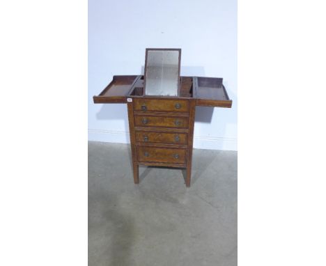 A Gentleman's Georgian mahogany toilet cabinet - the top opening to reveal a strut back mirror and compartment top above one 