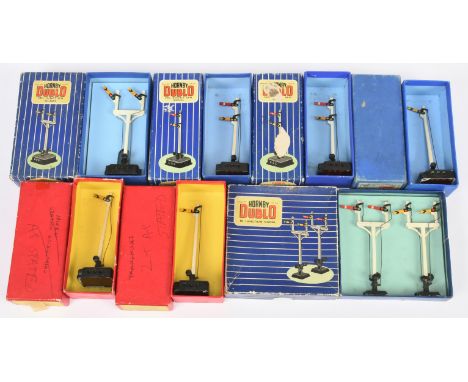 Hornby Dublo group of manual and electric signals. Please note two are in RARE plain red type boxes. Conditions are generally