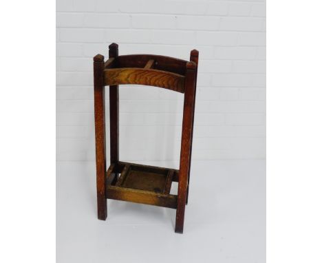 An early 20th century oak stick stand, 74 x 38cm 