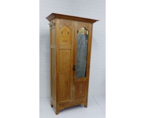 An oak and inlaid Art Nouveau wardrobe, 195 x 95cm 