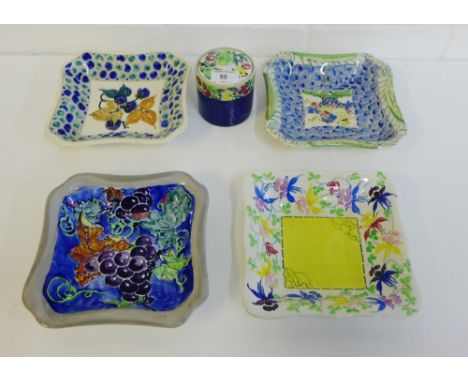 A collection of Bough Scottish pottery to include four square dishes with hand painted fruit and vine and flower patterns to 