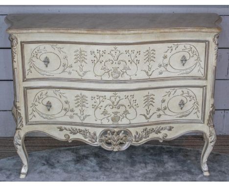 SERPENTINE COMMODE, 138cm W x 90cm H x 60cm D Louis XV style cream painted and silvered with simulated marble top and foliate