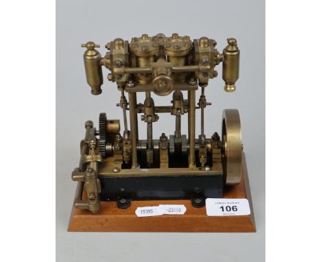Horizontal beam, single cylinder reciprocating engine with reverse 