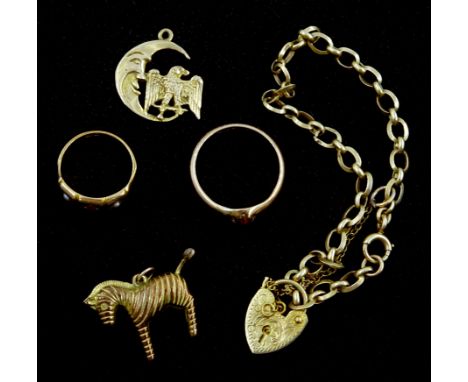 Victorian 15ct gold three stone ruby and split pearl ring, 9ct gold link bracelet,  two charms including zebra and moon and a