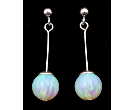 Pair of silver opal pendant earrings, stamped 925 Condition Report:Length = 30mm, good condition 