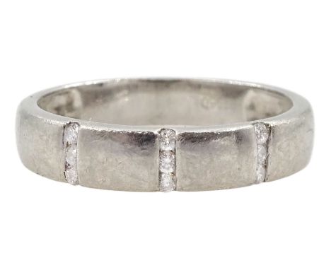 Platinum diamond set wedding band, three rows each with three rubover set diamonds, hallmarkedCondition Report:Approx 4.15gm,