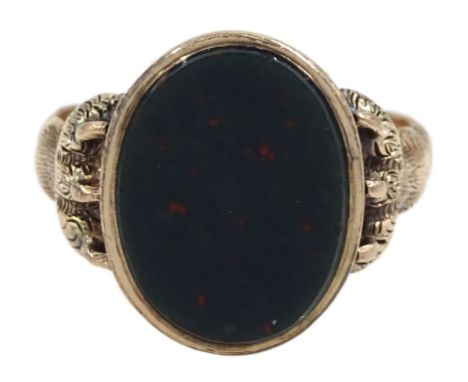 Victorian 9ct rose gold single stone bloodstone signet ring, with textured animal claw shoulders, Birmingham 1873Condition Re