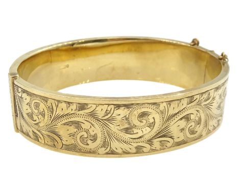 9ct gold hinged bangle with bright cut decoration by Henry Griffith &amp; Sons Ltd, BirminghamCondition Report:Approx 23.05gm