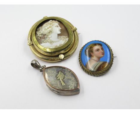 Victorian silver pendant photograph locket, together with a gilt metal mounted shell carved cameo portrait, and a gilt metal 