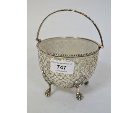Victorian silver sugar basin with swing handle and an opaque glass liner, Birmingham 1856, 7oz t excluding liner