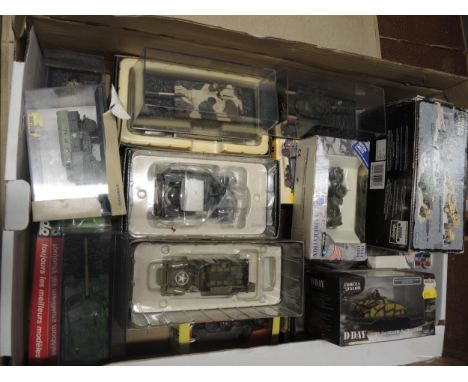 Two boxes containing a collection of various diecast metal military vehicles boxed, including Corgi, Solido